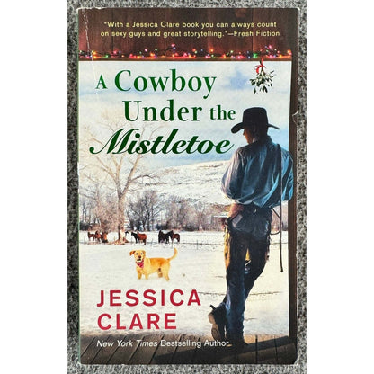 A Cowboy Under the Mistletoe by Jessica Clare (Paperback) - Image 1