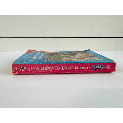 A Baby to Love by Susan Kearney (Paperback)
