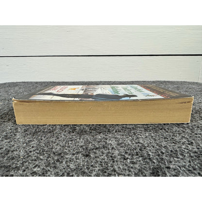 A Cowboy Under the Mistletoe by Jessica Clare (Paperback)