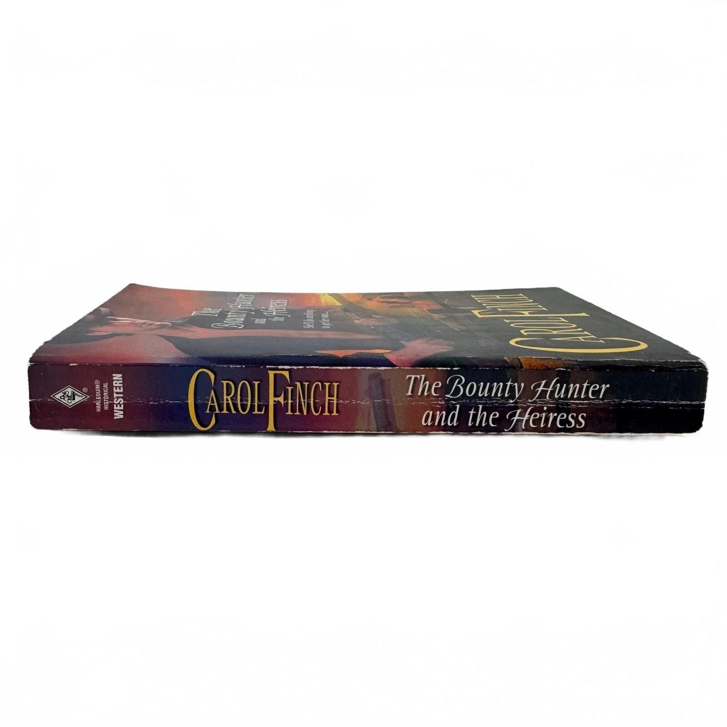 The Bounty Hunter and the Heiress by Carol Finch (paperback)