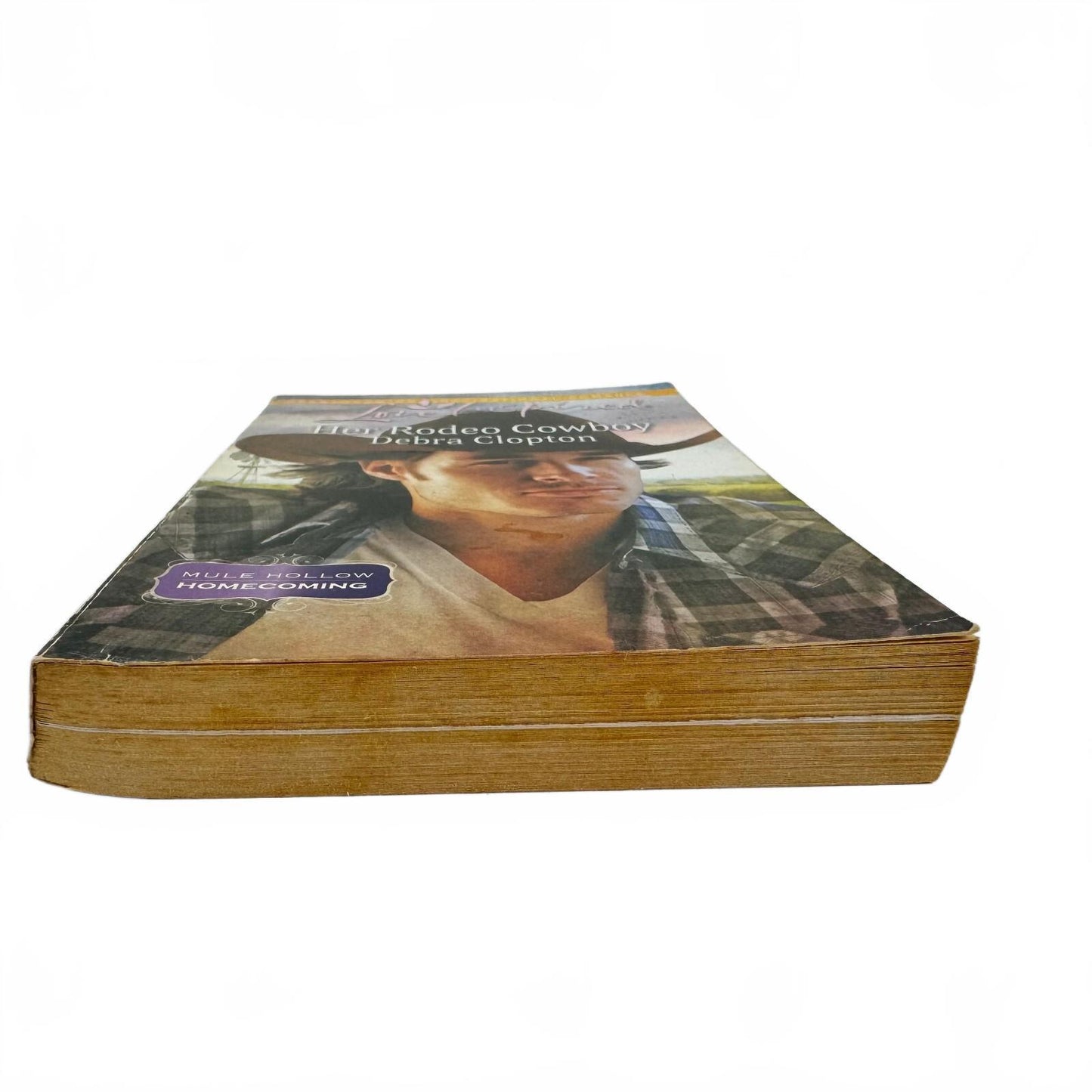 Her Rodeo Cowboy by Debra Clopton (paperback)