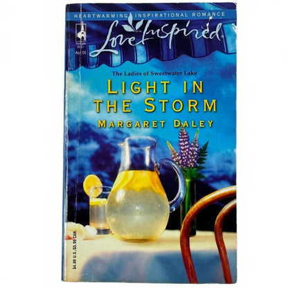 Light in the Storm by Margaret Daley (paperback)