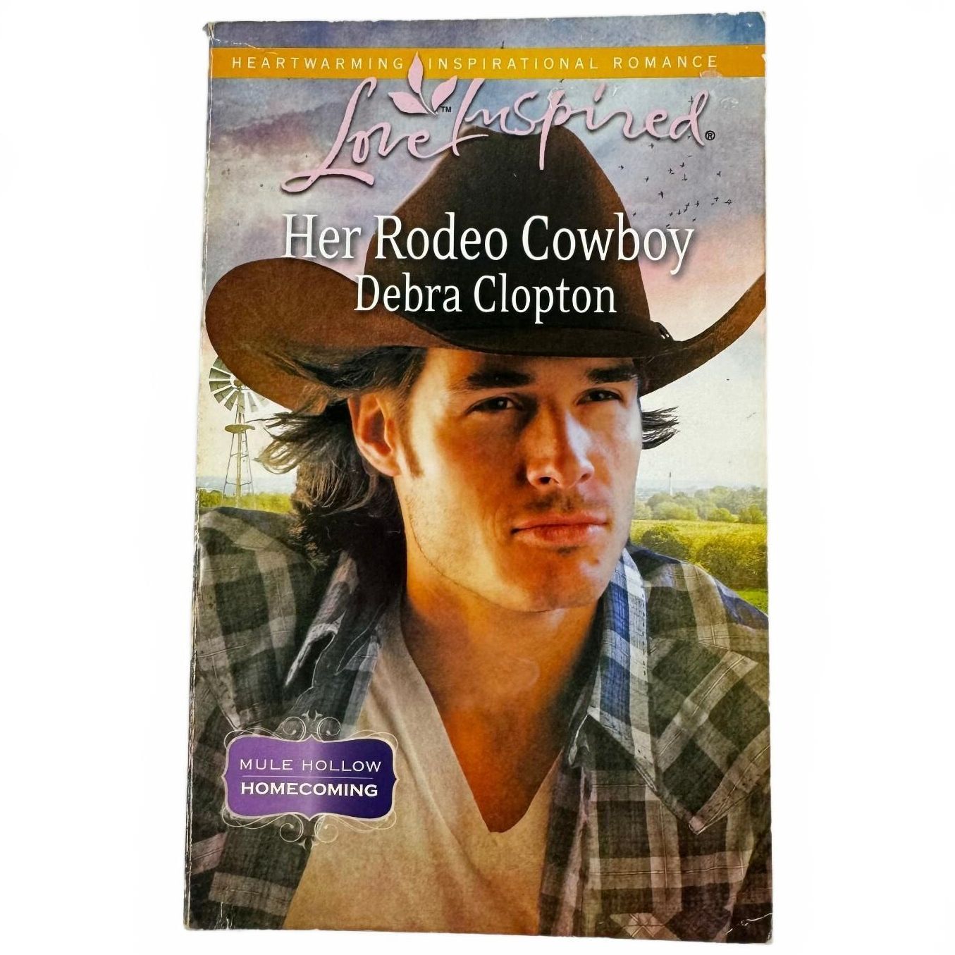 Her Rodeo Cowboy by Debra Clopton (paperback)